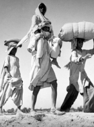 A group migrates to its new homeland after the partition of India in 1947