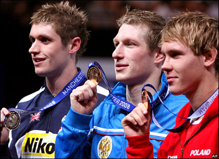 Britain's David Davies took silver at the World Short Course Swimming, behind Yuriy Prilukov of Russia, with Poland's Mateusz Sawrymowicz third