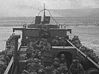 US troops aboard a landing craft head to Omaha beach, 6th June 1944