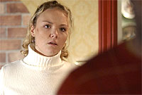 Charlie Brooks fel Janine Butcher