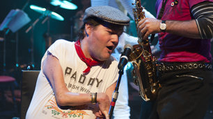 John Kelly singing to Daniel McGowan's saxophone