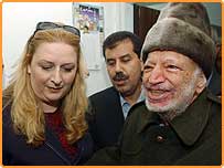 ياسر عرفات و همسرش سها