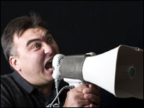 Man shouting into megaphone