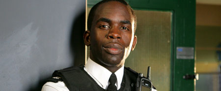 Jimmy Akingbola as Neil Parker