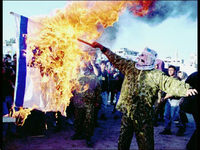 Спалення ізраїлських символів.