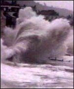 Waves breaking over rocks