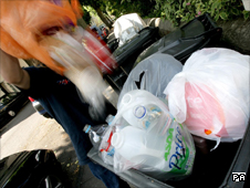 Man emptying his rubbish