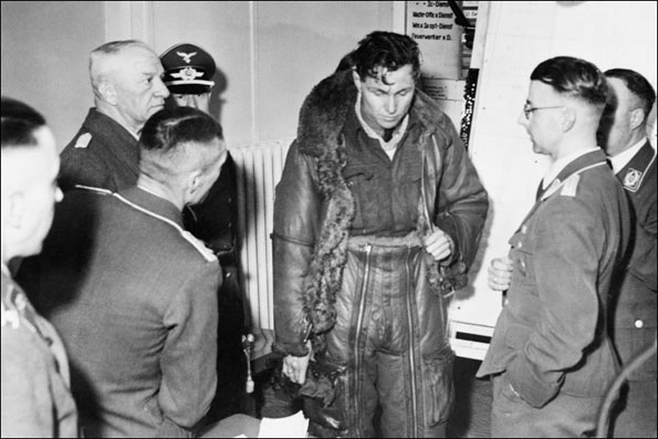 An RAF crew member from a Halifax bomber being interrogated by Luftwaffe officers