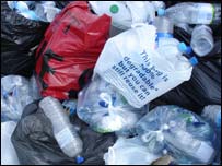 Empty bottles piled by a Churchdown bottle bank