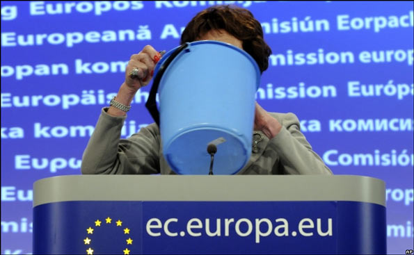Neelie Kroes behind a plastic bucket