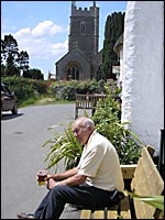 Dennis having a pint