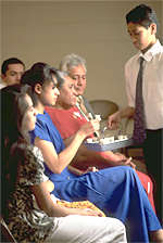 The sacrament is distributed to the congregation by a deacon