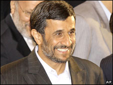 Iranian President Mahmoud Ahmadinejad, smiles during a summit of the Shanghai Cooperation Organization in the Ural Mountains city of Yekaterinburg, Russia, Tuesday, June 16, 2009