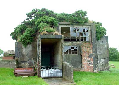 Huge structure about a mile outside Kilkeel, thought to be a standby generator base but odd extra features are puzzling