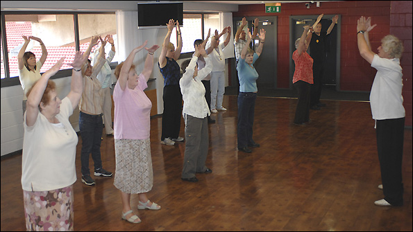 The Extra Timers at Watford practise Tai Chi. 