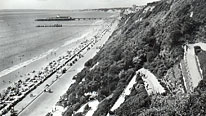 Postcard - view along the front that joins Boscombe to Poole with the Purbecks in the distance