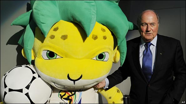 Blatter poses with the World Cup mascot, Zakumi