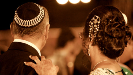 The bride’s aunt and uncle, Elizabeth and Shalom Judah