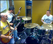 Members of the band Starskey performing live