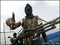 Masked militant holding gun in the oil-rich Niger Delta region