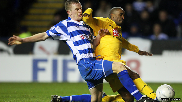 Alex Pearce challenges Tottenham's Jermain Defoe during an FA Cup tie in January 2008