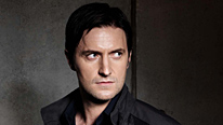 Lucas's (Richard Armitage) past catches up with him