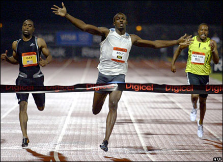 Tyson Gay and Darvis Patton are yards behind Bolt