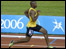 Jamaica's Asafa Powell wins a gold medal in the 2006 Commonwealth Games