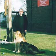 Father Peter with his dogs,
