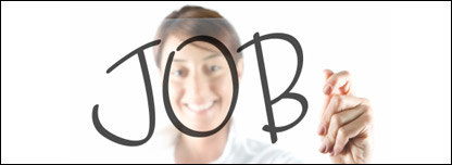 A woman writing the word 'job' on a window