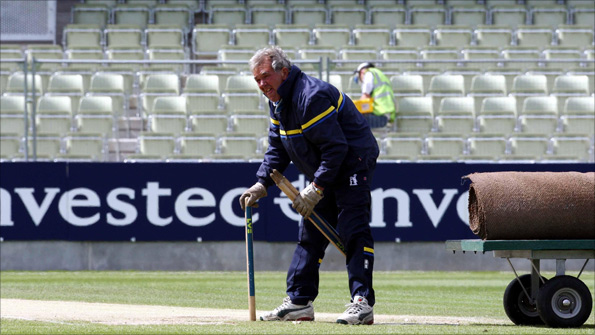 Warwickshire groundsman Steve Rouse prepares the Edgbaston pitch
