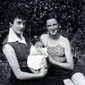 Patricia and her sister Carol in 1955. Patricia is holding her first born child, Ashley
