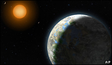 An artist's impression of Gliese 581g and its parent star
