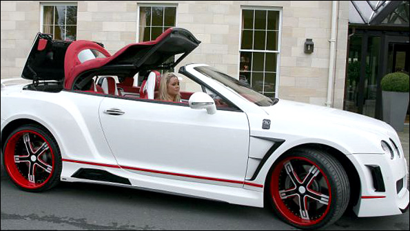 Stephen Ireland's girlfriend and the Bentley (Copyright Cavendish Press)