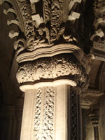 The top of a carved stone pillar