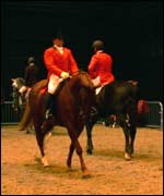 A two riders at The Horse Of The Year Show 2002 