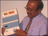 elections commissioner with new voting machine 