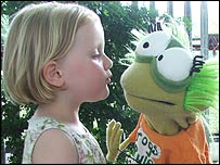 A little girl with Jelly from CBeebies