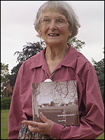 Nora Dixon with her book, Down Poulshot