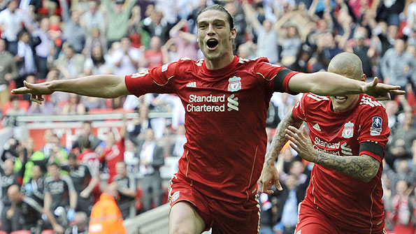 Andy Carroll celebrates his winner against Everton