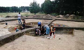 Kazak archaeologists excavating a Botai house at Vasilkovka