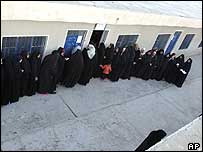 queus at a pooling station, Sadr City, Baghdad