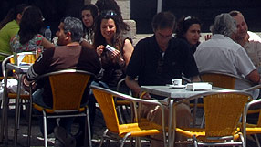 People in an outdoor café in Lisbon