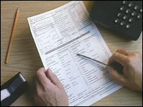 Someone filling in a form