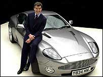 James Bond star Pierce Brosnan with Aston Martin car
