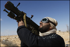 Libyan rebel fighter aiming an anti-aircraft missile 