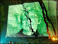 Charlie Morrissey's art projected onto East Cliff, West Bay (photo Pete Millson)