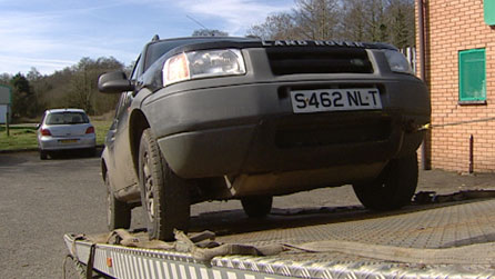 A Land Rover on a trailer