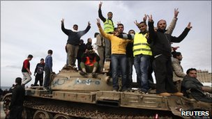 Photo showing protesters in Benghazi celebrating their takeover of the city