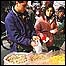 Vendedor de alimentos nas ruas de Pequim